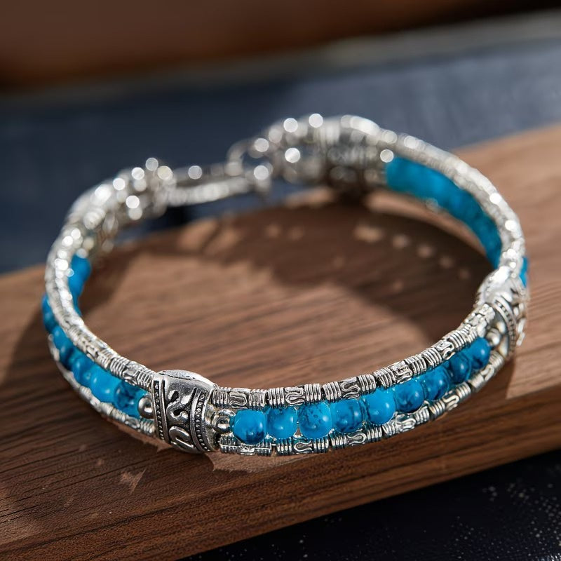 Women's Beaded Bracelet with Feather Charm